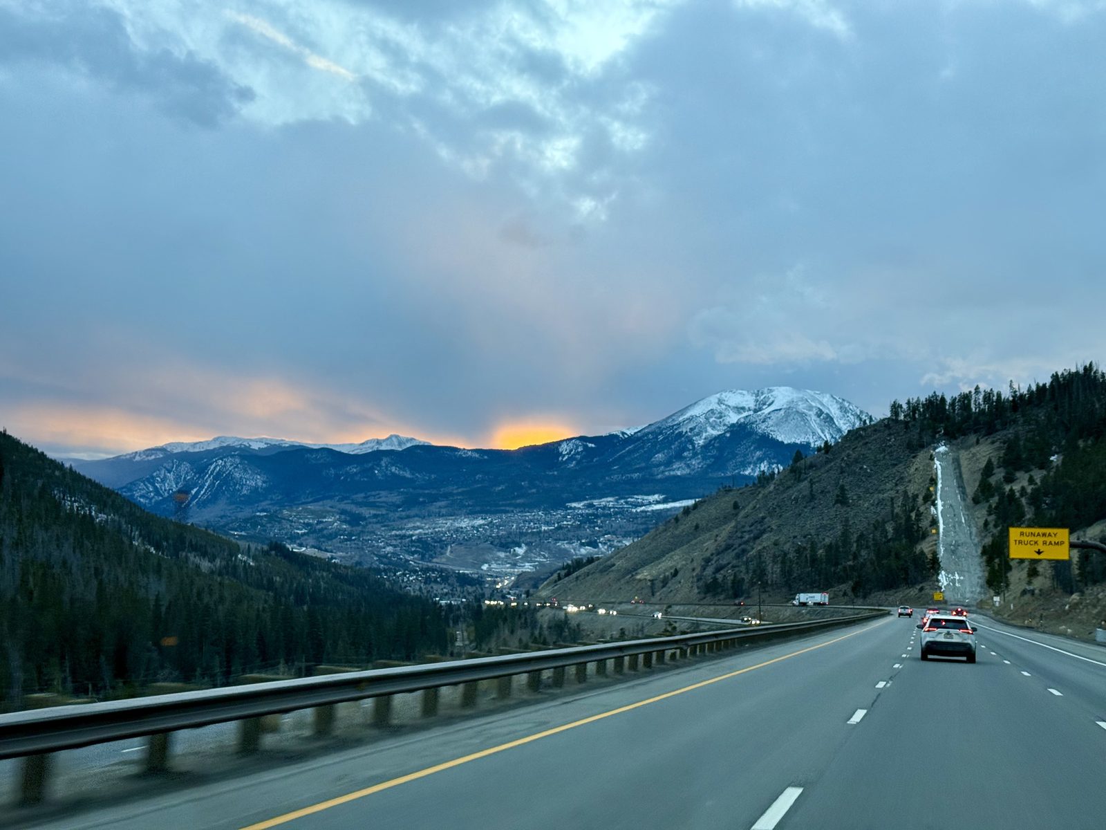 winter drive on I-70 through the Rocky Mountains toward Aspen