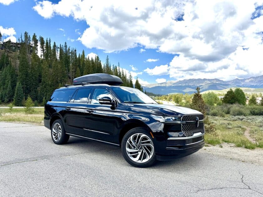 Blue Sky Limo Lincoln Navigator L with rooftop cargo box near Breckenridge, Colorado