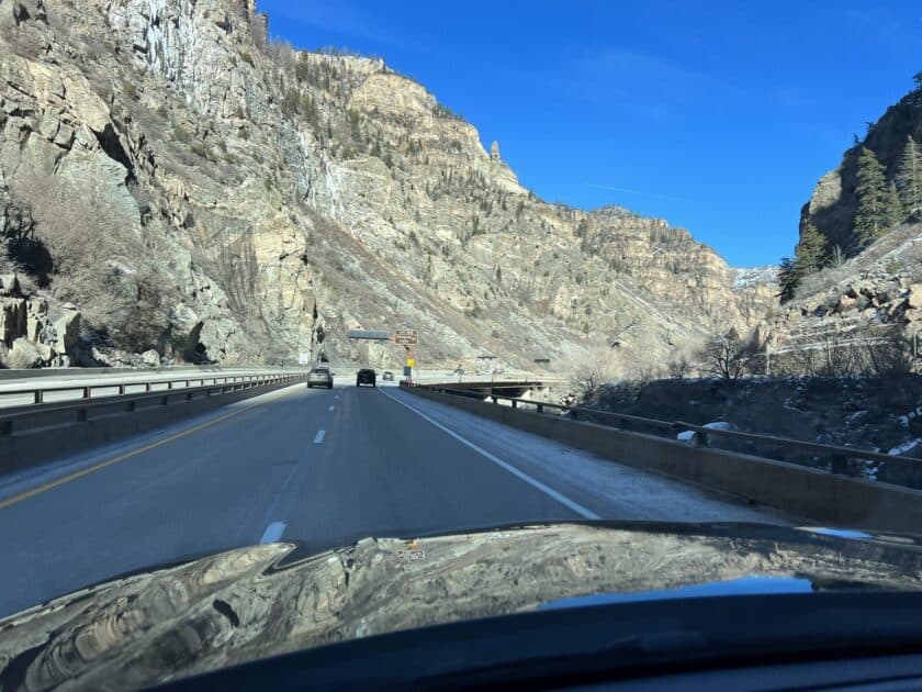 I-70 running through the steep rock walls of Glenwood Canyon on the drive from Denver to Aspen