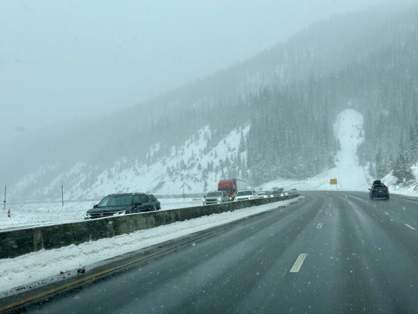 Winter traffic backed up on a snowy I-70 in the Colorado mountains